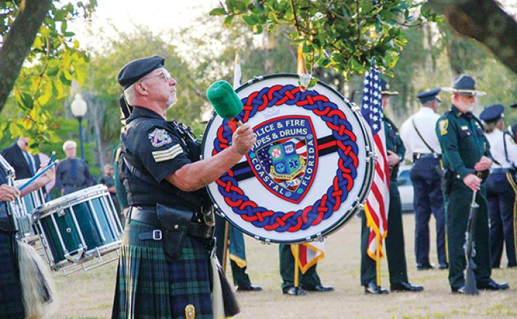 SARAH CAVACINI/Palatka Daily News – Members of Coastal Florida Police & Fire Pipes & Drums begin the Law Enforcement Memorial Service in Palatka on Tuesday.
