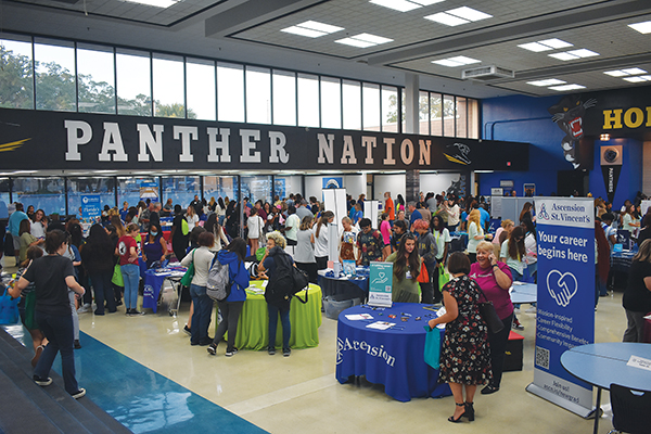 BRANDON D. OLIVER/Palatka Daily News – Local students and parents peruse the recruiter tables Tuesday evening at the Putnam County College & Career Fair at Palatka Junior-Senior High School.