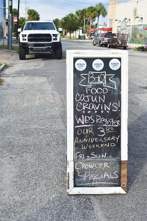 BRANDON D. OLIVER/Palatka Daily News – A sign outside Azalea City Brewing Co. informs passers-by about the live music to celebrate the business' anniversary.