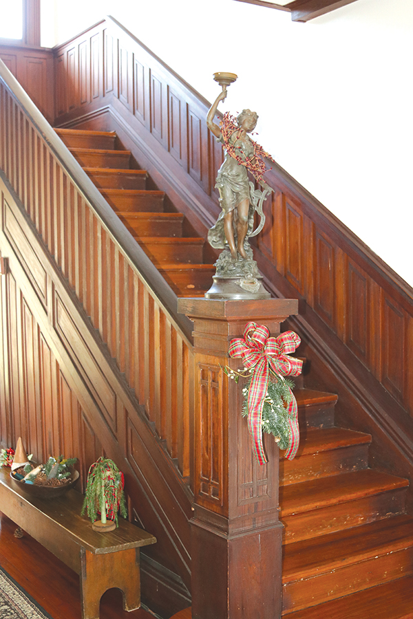 TRISHA MURPHY/Palatka Daily News – An original L.F. Moreau statue sits on the stairway at the Wilson-Cypress Home in Palatka.
