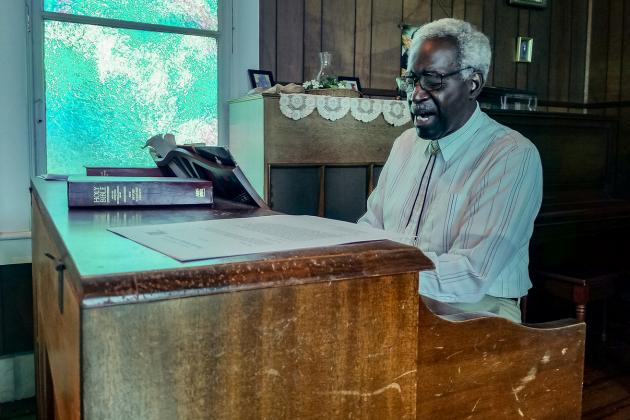 John Alexander plays the organ at St. Mary's Episcopal Church in Palatka.