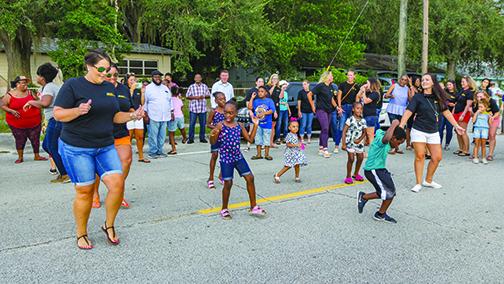 Moseley Elementary students, staff and parents celebrate's the school's improvements in July.