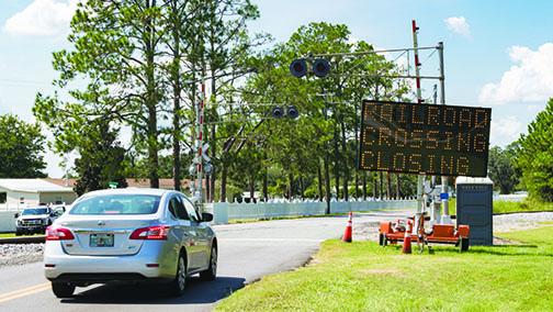 A sign notifies Satsuma residents of a closure in September.