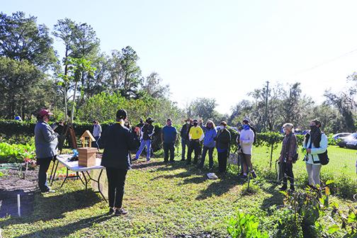 Mandi Tucker of the city of Palatka and Water Works Environmental Education Center volunteer Shann Purinton give a gardening talk Saturday.