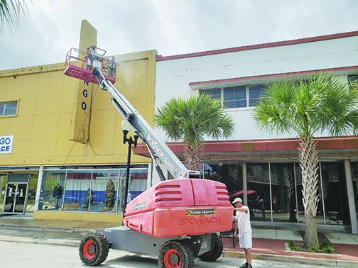 The Bingo Palace exterior in Palatka receives maintenance in hopes of it becoming a new business in 2021.