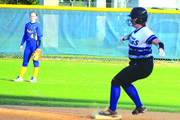 Interlachen High’s Sierra Boynton arrives at second base with a double after breaking up Amy Kennedy’s no-hit bid in last year’s county softball tournament against Palatka. (MARK BLUMENTHAL / Palatka Daily News)