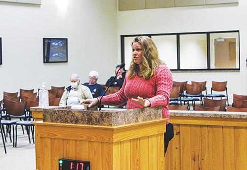 Crescent City resident Janet Sornberger tells the Putnam County Board of Commissioners on Tuesday why approving a zoning change would be detrimental to the area.
