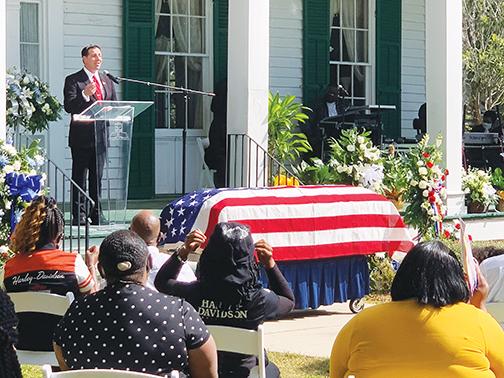 Welaka Mayor Jamie Watts eulogizes his former colleague, Welaka Town Council member Willie Washington, during Washington’s funeral Wednesday morning at the Bronson-Mulholland House in Palatka.