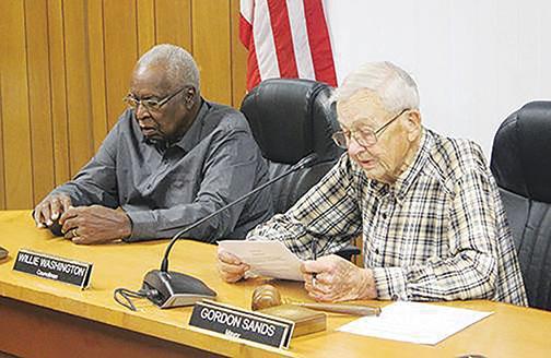 Former Welaka Mayor Gordon Sands, right, and Welaka Town Council member Willie Washington, both of whom died this month, conduct business at a previous council meeting.