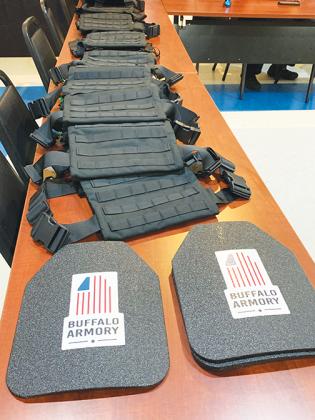 The 10 vests donated by InVestUSA to the Palatka Police Department are displayed Wednesday.