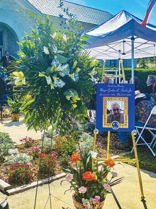 A memorial stands at Welaka Town Hall on Saturday in memory of former Mayor Gordon Sands as family and friends gather to celebrate his life.