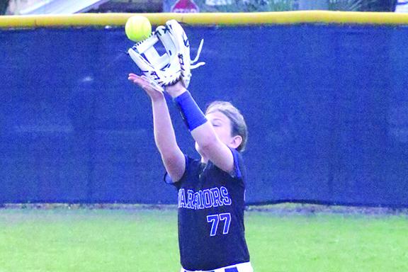 Peniel Baptist Academy right fielder Allie Peacock secures a second-inning out against Jacksonville University Christian. (ANTHONY RICHARDS / Palatka Daily News)
