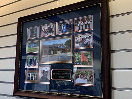 A wall at the Interlachen Post Office is adorned with photos of Interlachen-born Medal of Honor recipient Robert H. Jenkins.