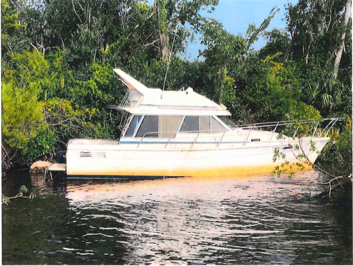 A derelict vessel sits on the St. Johns River in Putnam County. 