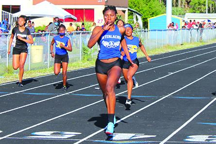 Interlachen’s Reva Godbolt crosses the line to win the 200-meter dash in a meet against Palatka last month. Godbolt and other county track athletes begin their quest for the state meet next month with Tuesday’s District 5-2A meet at Alachua Santa Fe High School. (MARK BLUMENTHAL / Palatka Daily News)