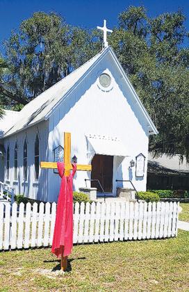 Trinity Episcopal Church in Melrose displays a cross Friday in honor of Easter Sunday.