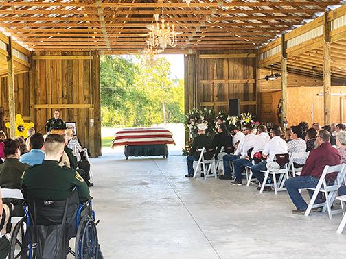 Sheriff Gator DeLoach gives the eulogy for Putnam County Sheriff’s Office Capt. Mark Elam at the captain’s funeral Monday afternoon.