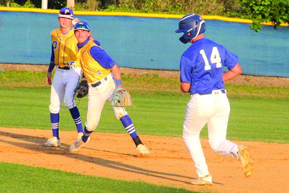 Palatka’s Hunter Keen delivers a throw to first base to complete a first-inning double play against Keystone Heights. The runner is Keystone’s Ty Glenn. (ANTHONY RICHARDS / Palatka Daily News)