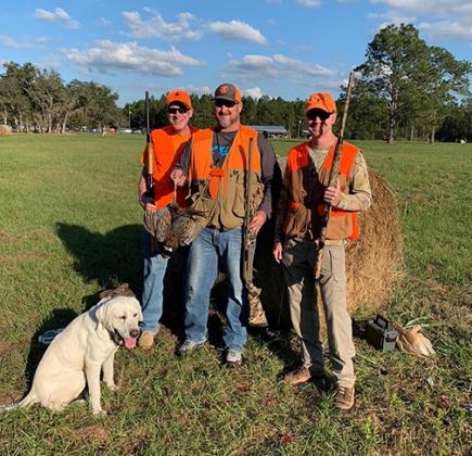 Hunters show off their haul from a pheasant hunt at Roberts Ranch in Palatka.