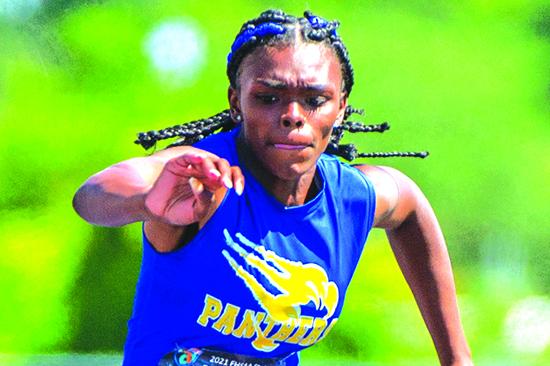  Palatka’s Khi’ya Lookadoo competes in the 100-meter high hurdles. (FRAN RUCHALSKI / Special to the Daily News)