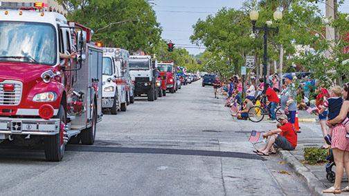 Hundreds of people line St. Johns Avenue during the 2019 Memorial Day parade in Palatka.