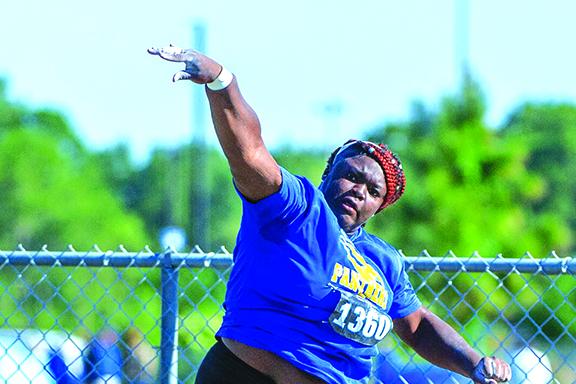 Palatka’s Torryence Poole lets loose of a throw during the shot put competition at the FHSAA 2A championships at Hodges Stadium at the University of North Florida. (FRAN RUCHALSKI / Special to the Daily News)