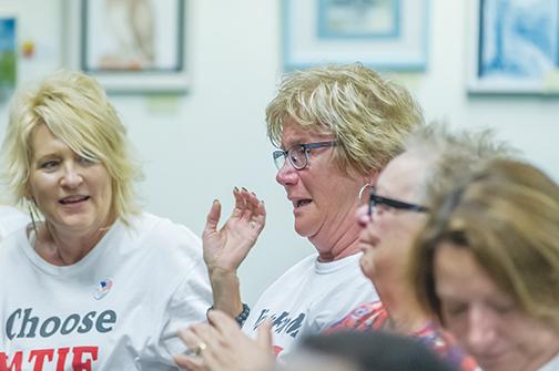 Kathleen “Katie” Berg, center, reacts to winning a seat on the Crescent City Commission during a special election April 30, 2019.