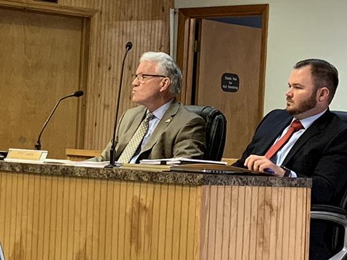 Bobby Pickens, right, with acting Crescent City Manager Phil Leary, listens during Thursday’s Crescent City Commission meeting. Pickens, of the law firm Holmes & Young, was confirmed as the city’s attorney, replacing retiring attorney Jay Asbury.