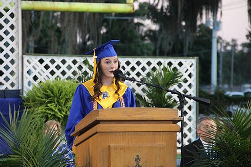 Graduate  Elizabeth Soncrant speaks during the ceremony, telling classmates to embrace the challenges ahead of them.