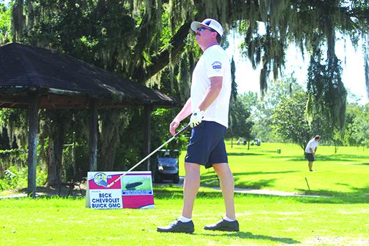 Rance White of Palatka looks at his tee shot on the par-3 sixth hole during Saturday’s Tracy Brown Memorial Tournament at the Palatka Municipal Golf Club. (MARK BLUMENTHAL / Palatka Daily News)