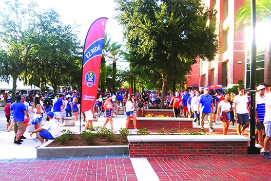 Fans file into Ben Hill Griffin Stadium before Saturday night’s kickoff between Florida and FAU. (MARK BLUMENTHAL / Palatka Daily News)