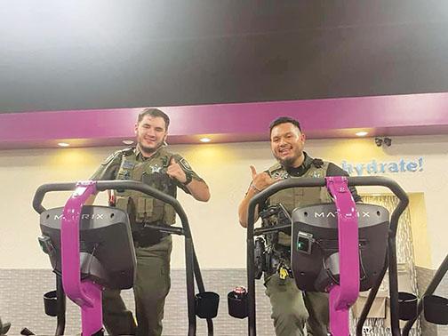 Putnam County Sheriff’s Office Cpls. Branden Bryant and Ricardo Martin complete the 9/11 Step Challenge after working a 12-hour shift Saturday to honor victims and first responders from the attacks 20 years ago.