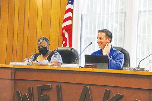 Officials in Welaka, one of the local municipalities expecting federal COVID-relief funds, participate in a town council meeting earlier this year.