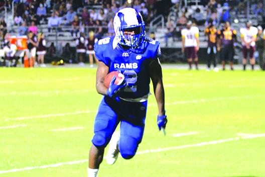 Interlachen’s Terryon Mitchell looks for running space during the first half of Friday night’s game against Crescent City. (MARK BLUMENTHAL / Palatka Daily News)