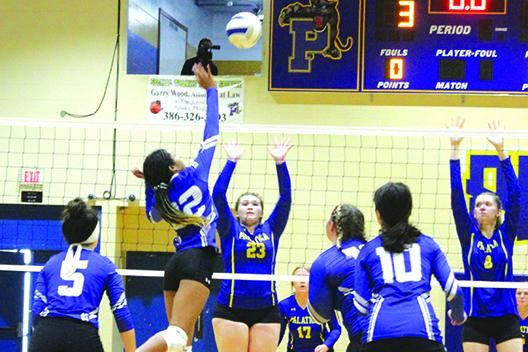 Interlachen’s Millesha Griffin, shown delivering a kill on Sept. 4 in a match against Palatka, delivered four aces, five digs, five kills and four blocks in the Rams’ victory over Palatka on Thursday at home. (MARK BLUMENTHAL / Palatka Daily News)