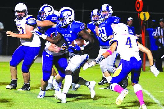  Interlachen’s Reggie Allen (1) navigates the field for some of his 270 yards rushing against Bell on Friday night. (MARK BLUMENTHAL / Palatka Daily News)
