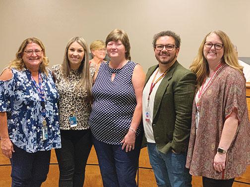 Sheryl Brunke, Samantha Edwards, Sindy Hunt, Oscar Jaimes and Heather Pogue, who completed the Putnam County School District’s Paras to Pros program, were honored at Tuesday’s school board meeting.