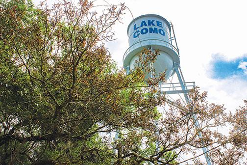 A water tower stands above the Lake Como Water Association headquarters in South Putnam.