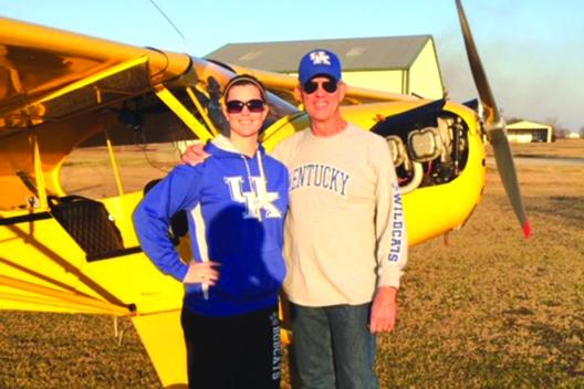 Former Palatka High School assistant football coach Bob Jones poses with his daughter Emily in front of his 1949 Piper J-3 Cub. (Submitted / BOB JONES)