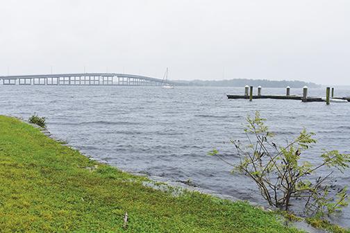 Choppy waters spill onto the shore of the St. Johns River in Palatka on Friday afternoon.