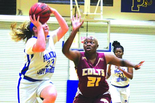 Palatka’s Samantha Clark, left, shown last year in a game against North Marion, scored 11 points in helping the Panthers take down Jacksonville Trinity Christian on Thursday. (MARK BLUMENTHAL / Palatka Daily News)
