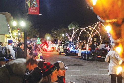  Parade-goers line St. Johns Avenue in downtown Palatka for the annual Christmas parade, which returned this year after last year’s cancellation because of COVID.