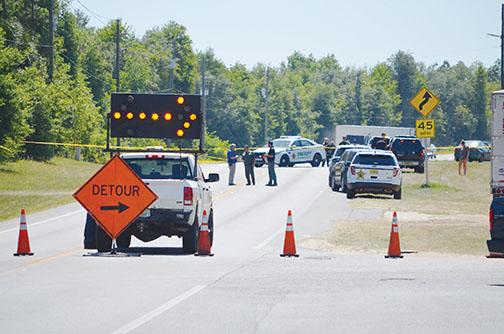 Vehicles block off the scene of the fatal shooting of Kody O’Hara in 2019 as Putnam County Sheriff’s Office deputies investigate the crime.