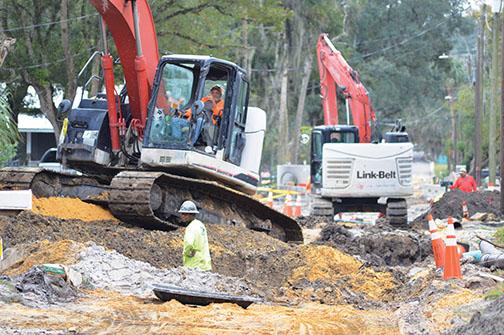 Construction crews dig up roads in a Palatka neighborhood so they can replace water lines that date back to the 1800s. 