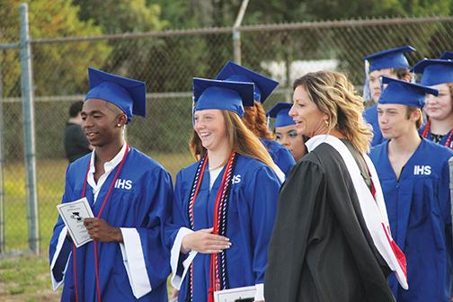 Interlachen High students prepare to walk onto the field for their graduation ceremony in June 2021.