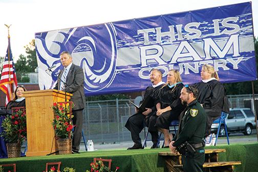 Superintendent Rick Surrency speaks during Interlachen High’s commencement ceremony in June 2021.