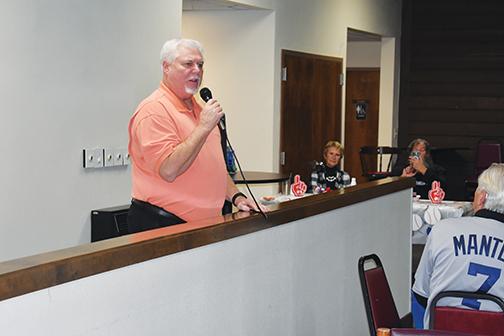 Putnam resident and former Major League Baseball player Bill Swaggerty speaks during the One Book, One Putnam kickoff event Tuesday evening.