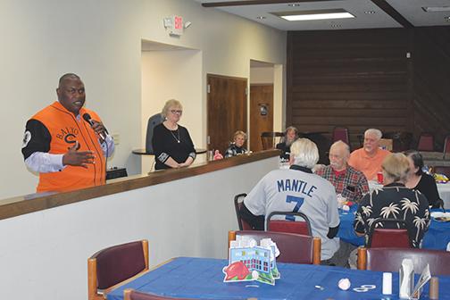 Palatka Mayor Terrill Hill talks about the Negro League and other contributions to baseball from Black players during the One Book, One Putnam kickoff event Tuesday. 