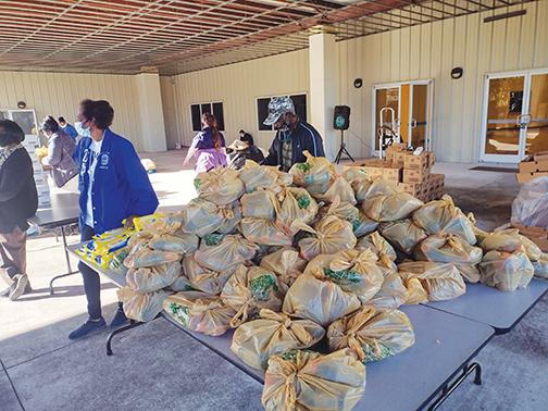 Bags of food are gathered to give out to people in need who show up at the Family Life Center on Wednesday morning. 