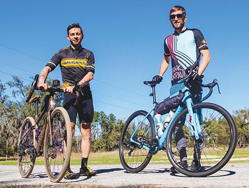 Umberto Arnulfo, left, a St. Augustine cycling tour guide, stands with fellow cyclist Trey Taylor at Coventry Oaks Farm before going for a ride in Putnam County.